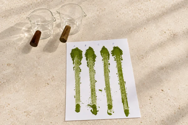 AI-assisted edit of four matcha sample streaks with session labels A, B, C and D